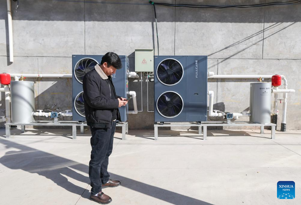 Famílias rurais adotam aquecimento limpo no Distrito de Tongxin, no noroeste da China